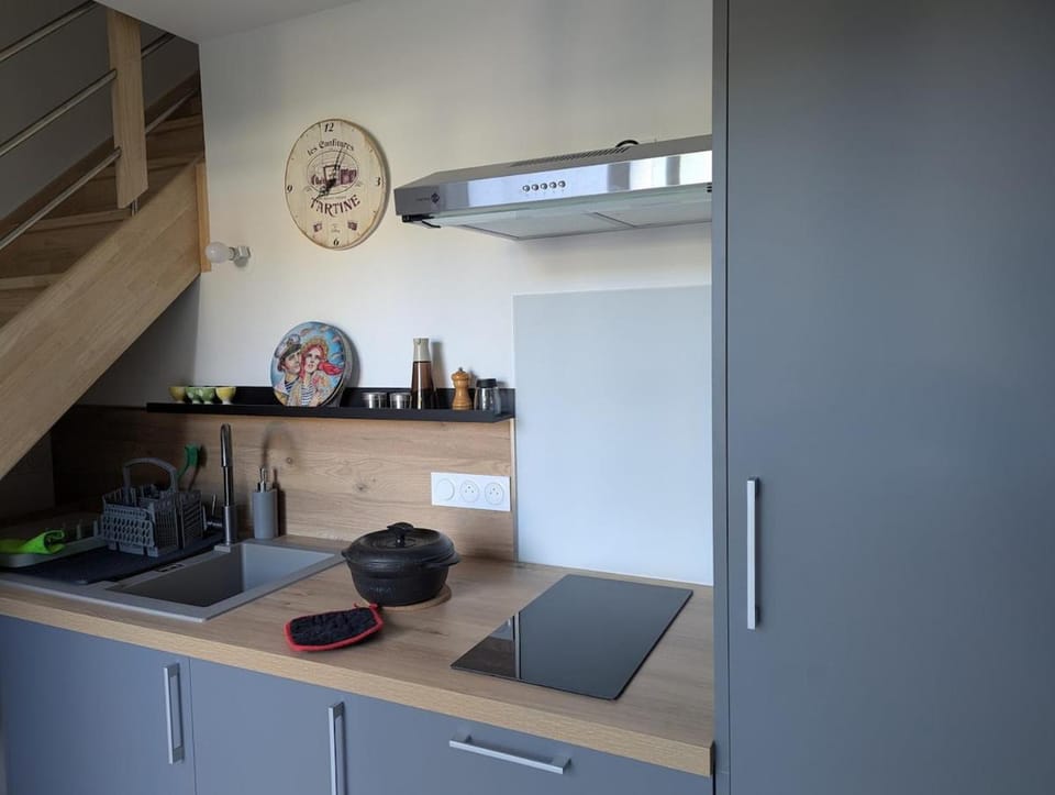 Kitchen or kitchenette, stove, toaster