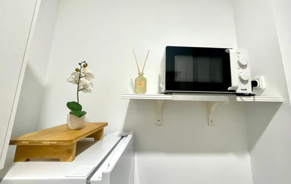 Kitchen or kitchenette, microwave