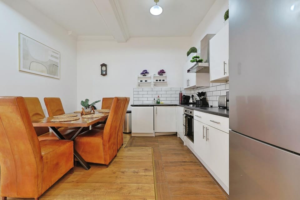 Kitchen or kitchenette, Seating area, Dining area, dishwasher, oven, stove, toaster