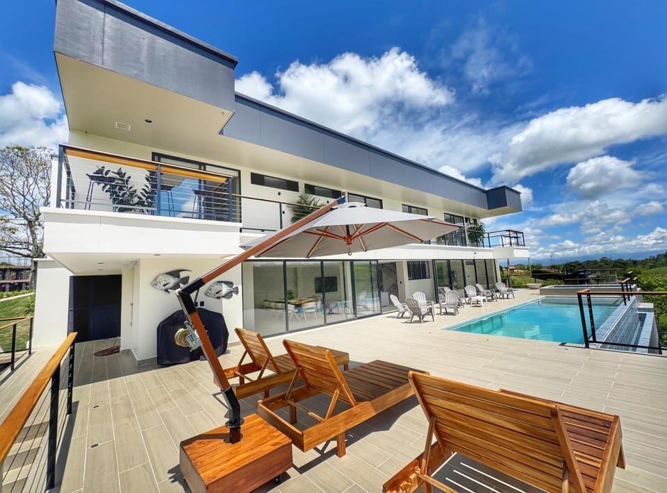 Property building, Patio, Day, Natural landscape, View (from property/room), Balcony/Terrace, Pool view, Swimming pool, sunbed