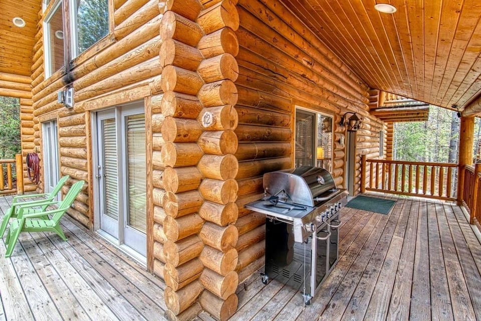 Luxurious Forest Cabin with Hot Tub and Game Room Near Outdoor Adventures in Island Park, Idaho Cabin in Island Park