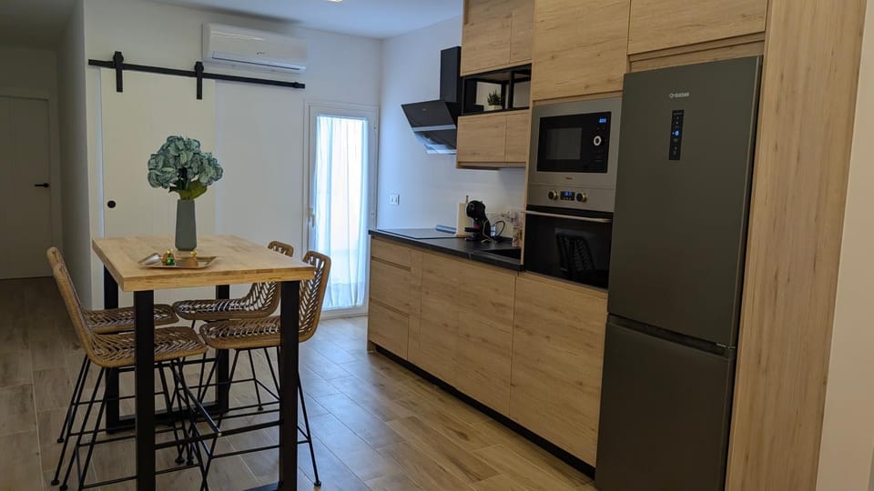 Kitchen or kitchenette, oven, stove, toaster