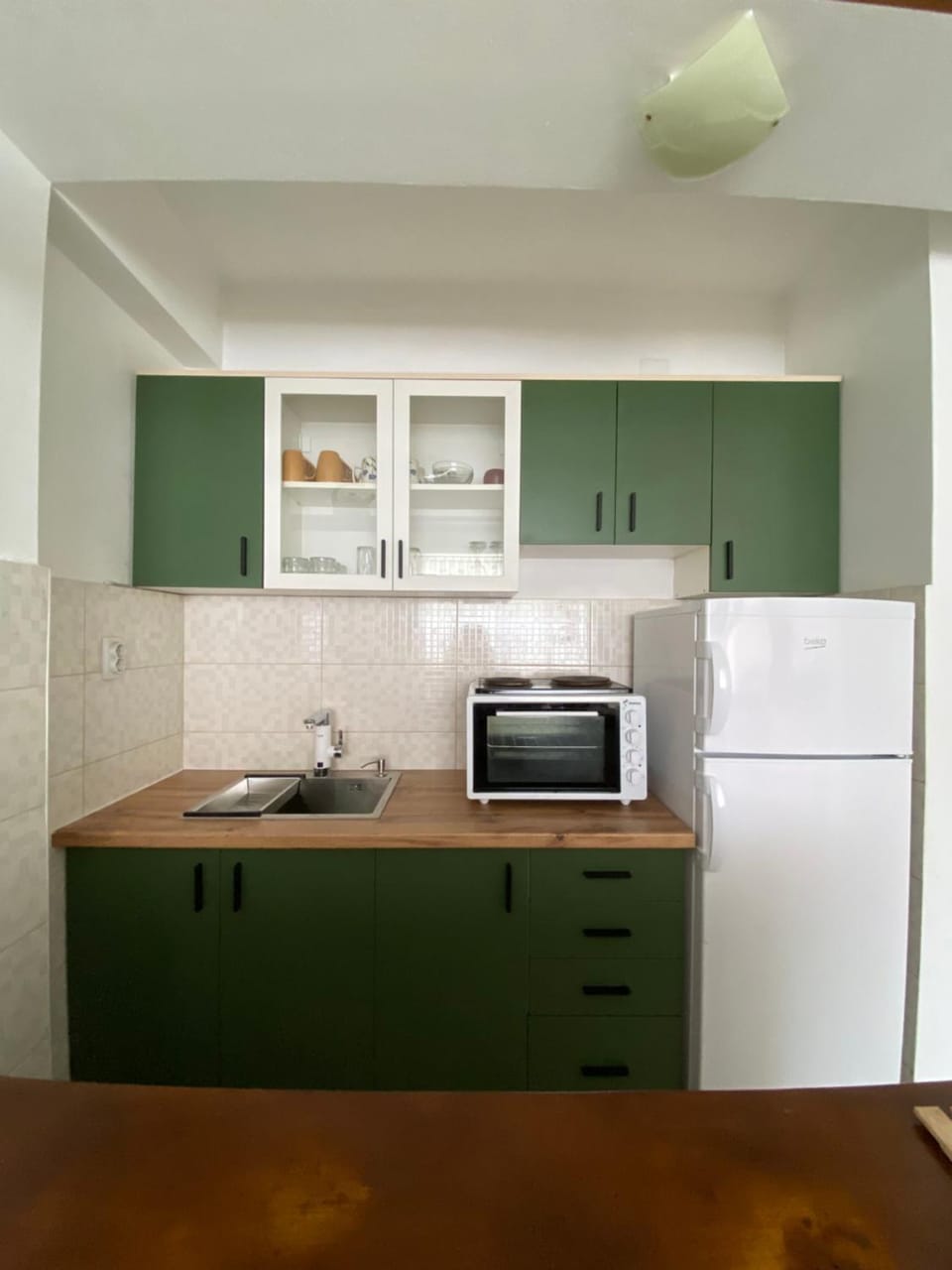 Kitchen or kitchenette, oven, stove