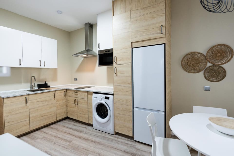 Kitchen or kitchenette, washing machine