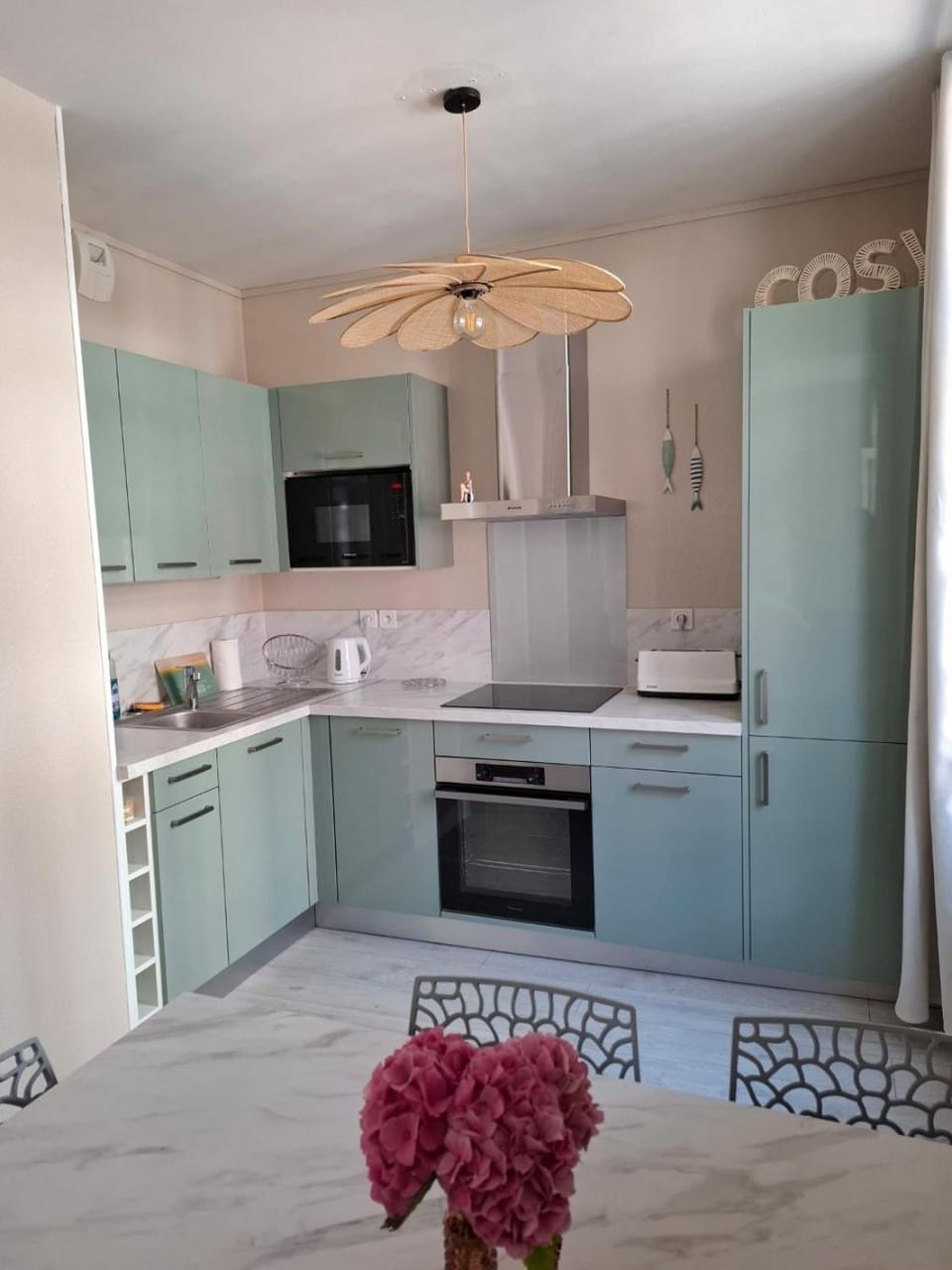 Kitchen or kitchenette, dishwasher, oven, stove