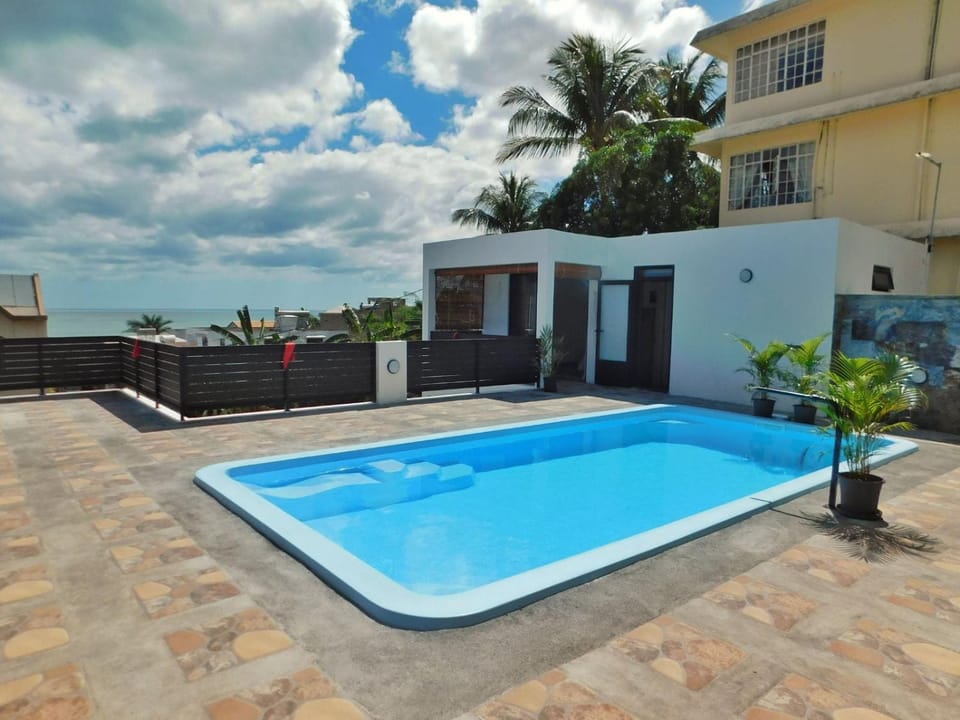 Property building, Day, View (from property/room), Pool view, Swimming pool, sunbed
