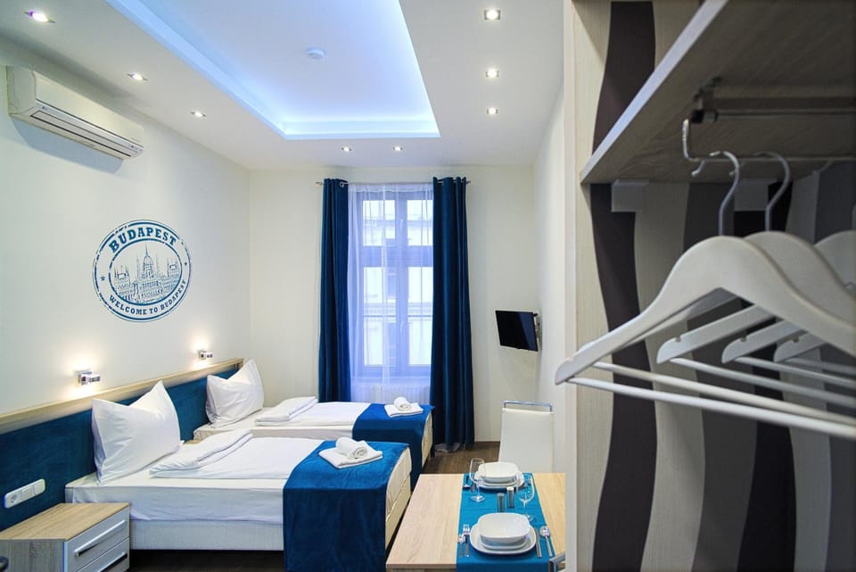 Bed, Bedroom, towels, wardrobe, air conditioner