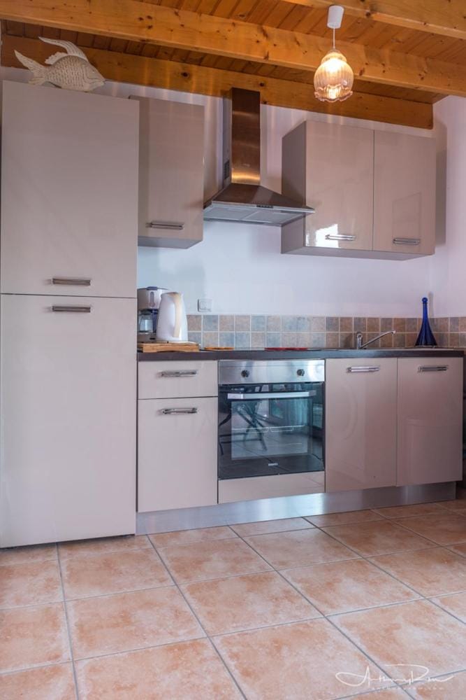 Kitchen or kitchenette, oven, stove