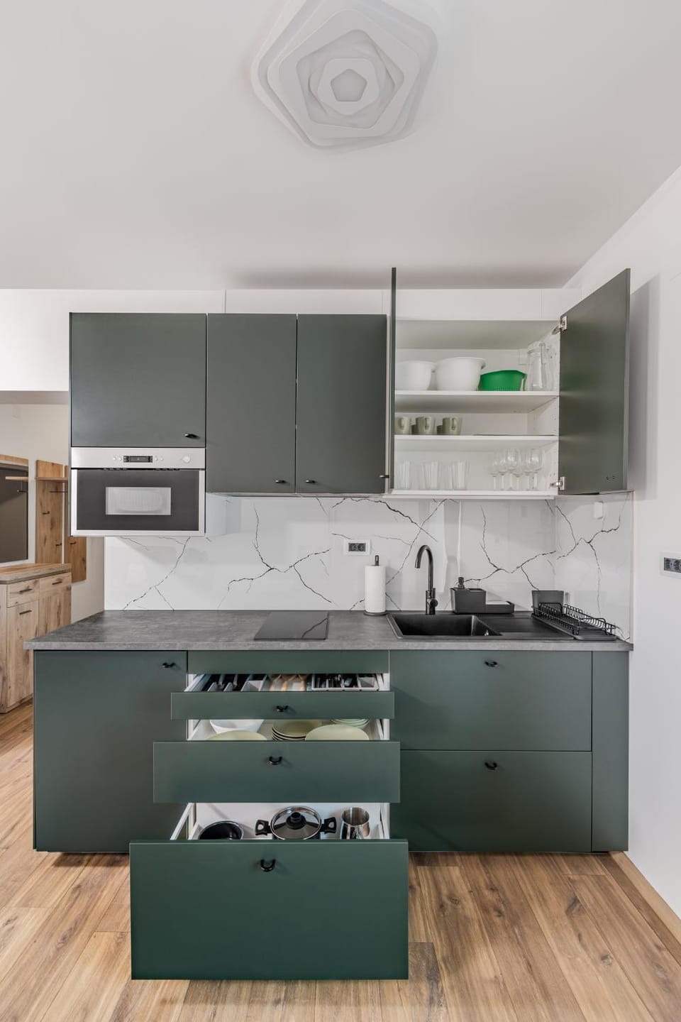 Kitchen or kitchenette, microwave, stove, toaster, kitchen