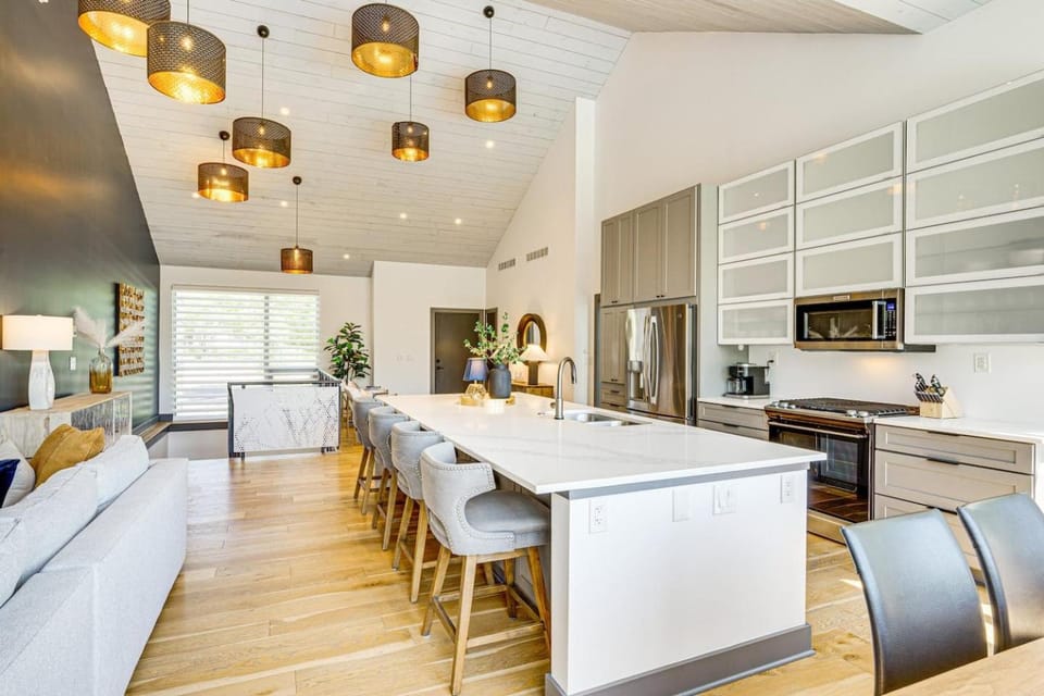 Modern Home with shipping Container Pool House in Overland Park