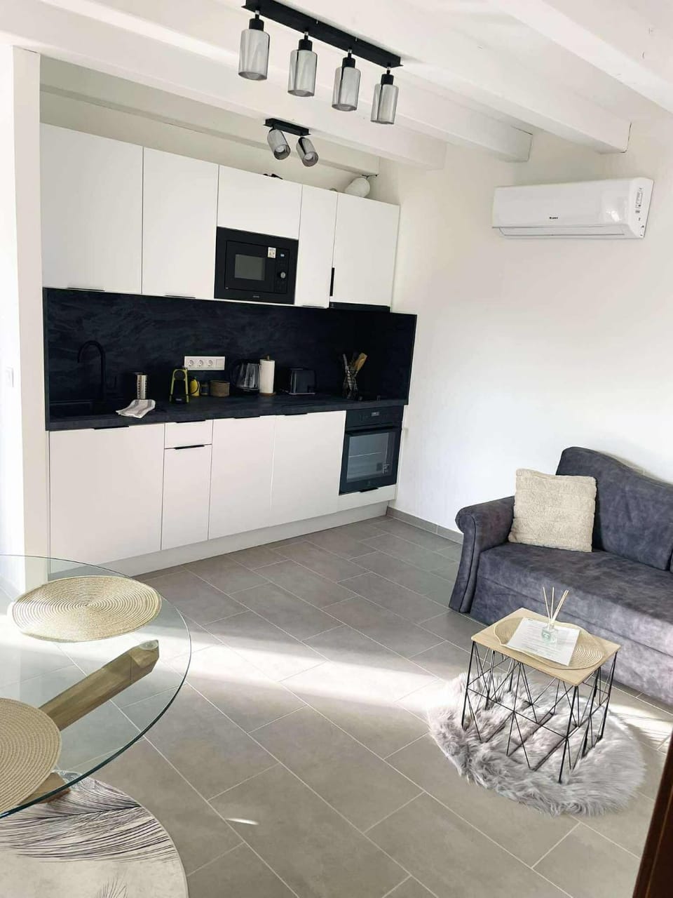 Kitchen or kitchenette, Living room, Dining area, microwave, stove, air conditioner