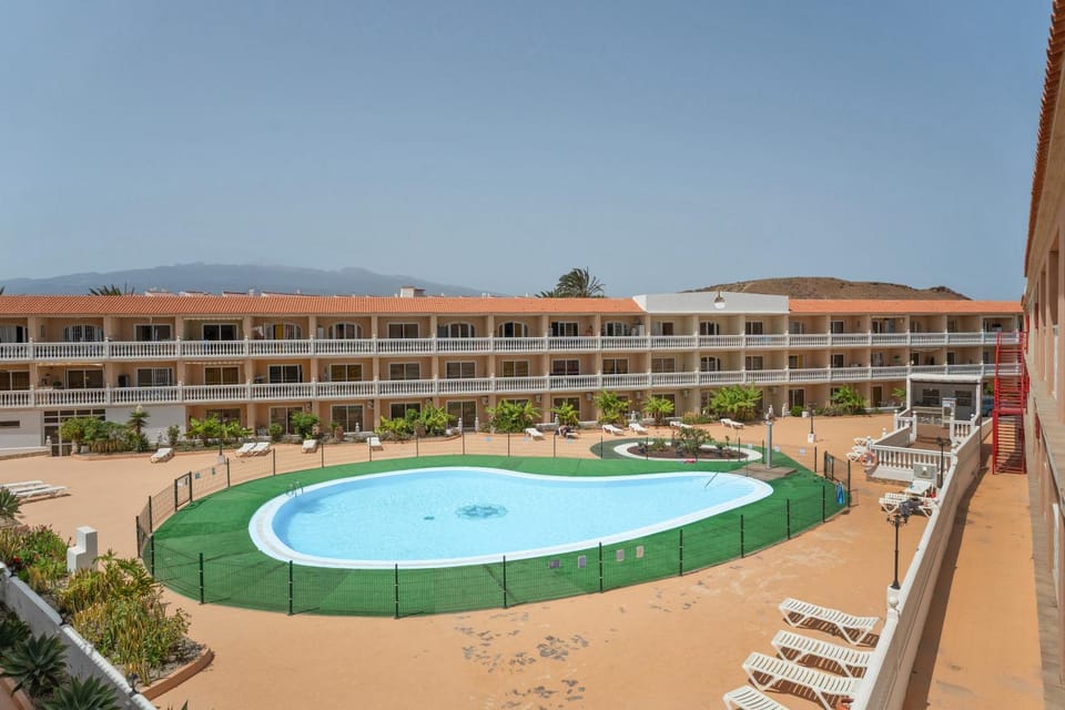 Property building, Living room, Swimming pool