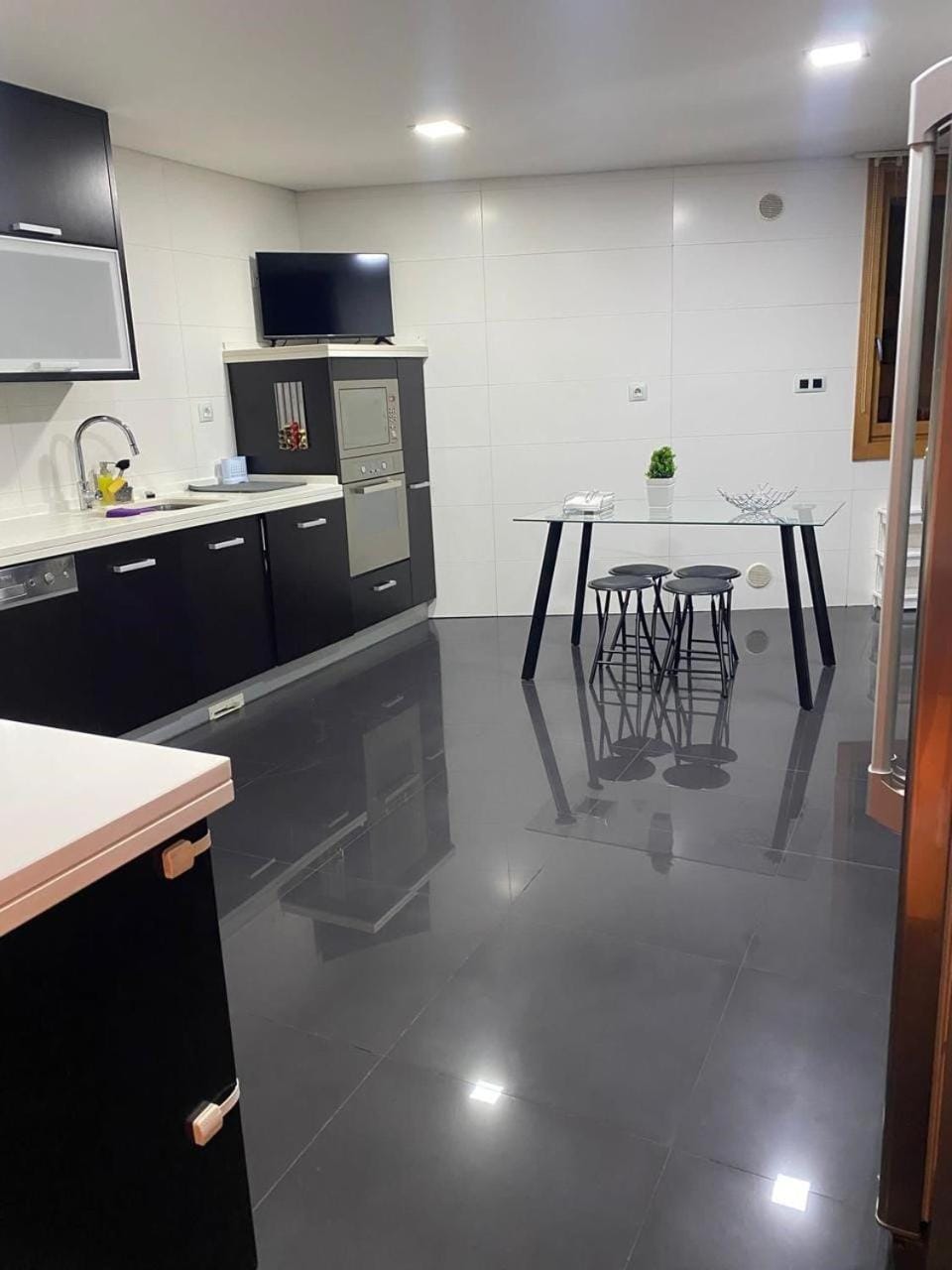 Dining area, dishwasher, oven, stove, washing machine, washing machine, dryer