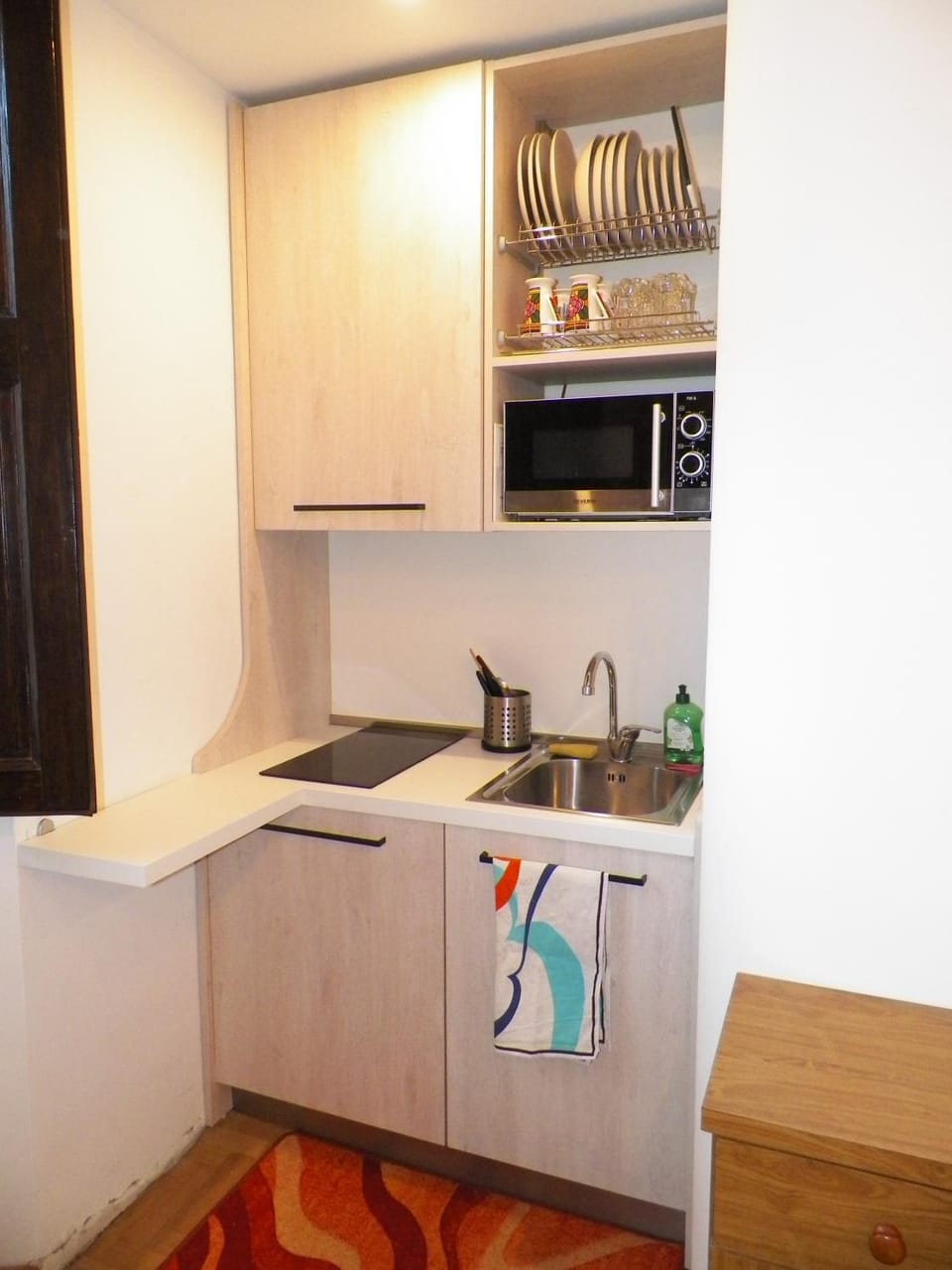Kitchen or kitchenette, microwave