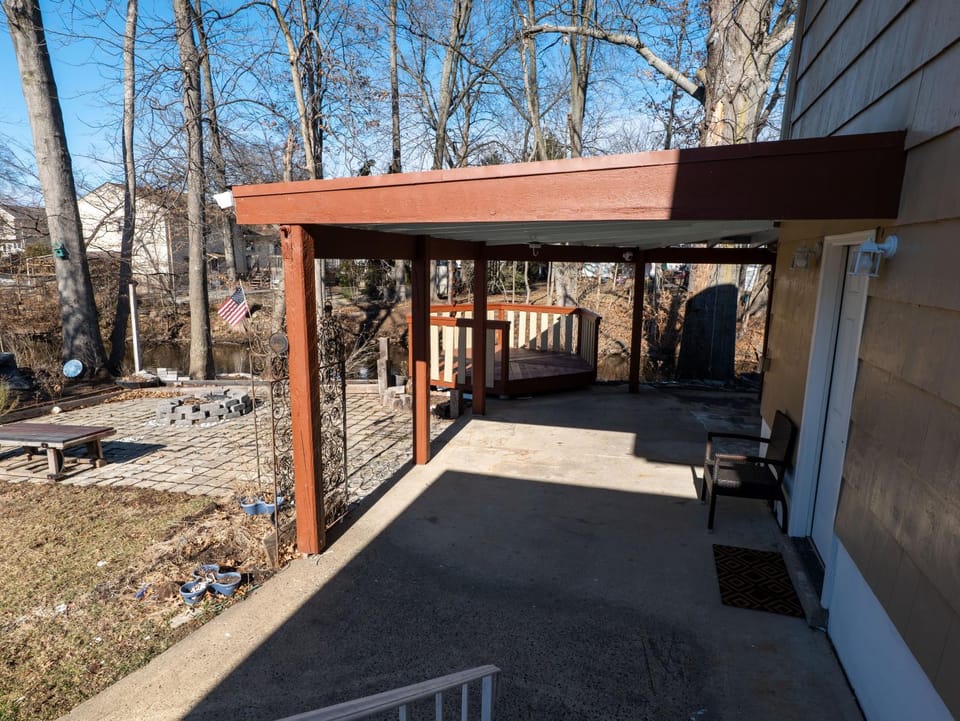 Property building, Patio, View (from property/room), Balcony/Terrace, Seating area, Lake view, River view, fireplace
