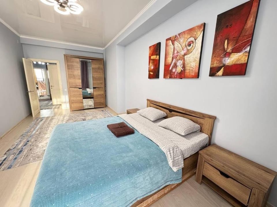 Bed, Bedroom, towels, wardrobe, air conditioner