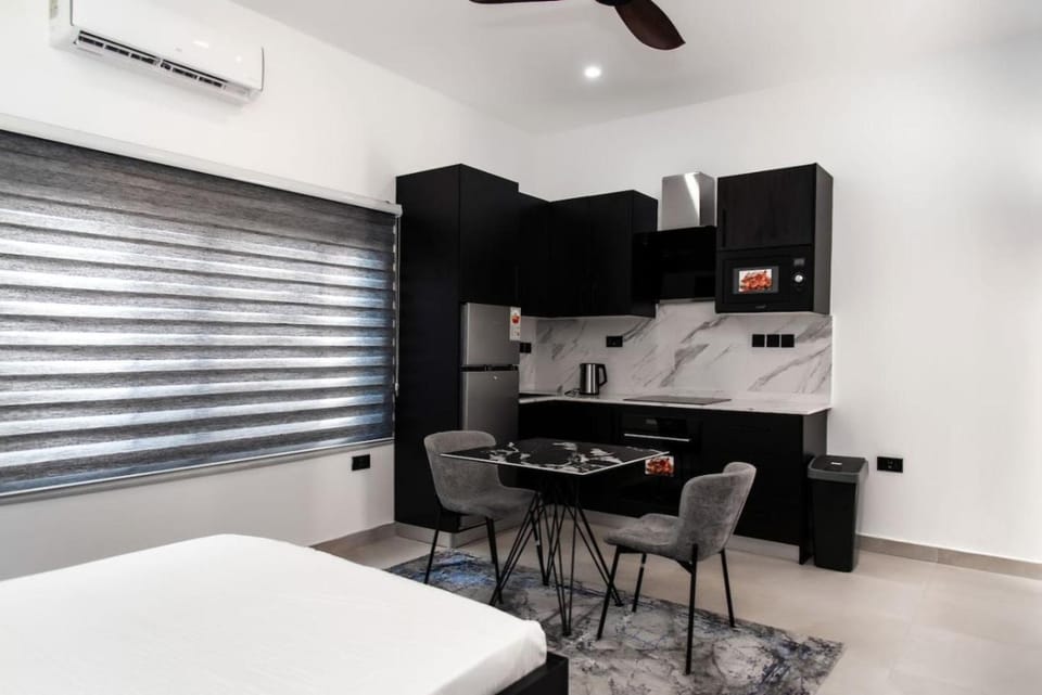 Bed, Photo of the whole room, Dining area, Bedroom, stove, air conditioner