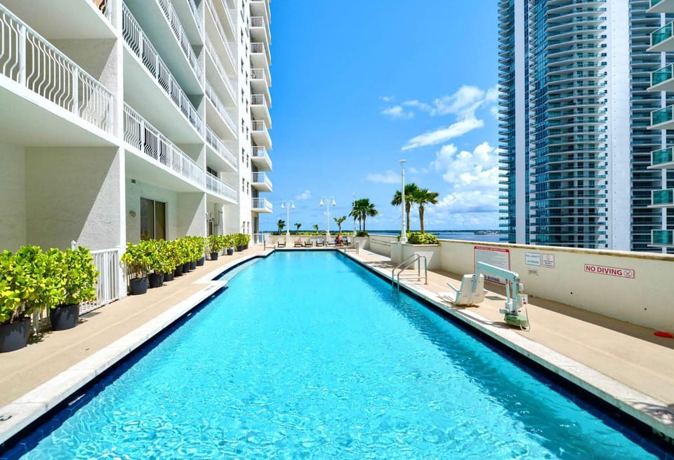 Property building, Pool view, Swimming pool, sunbed