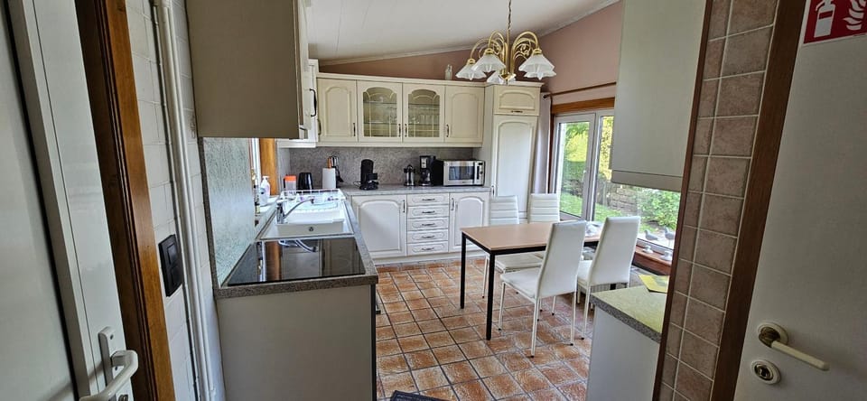 Kitchen or kitchenette, dishwasher, oven, stove, toaster