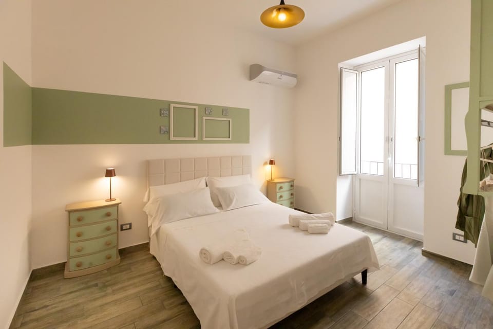 Bed, Photo of the whole room, Bedroom, towels, air conditioner