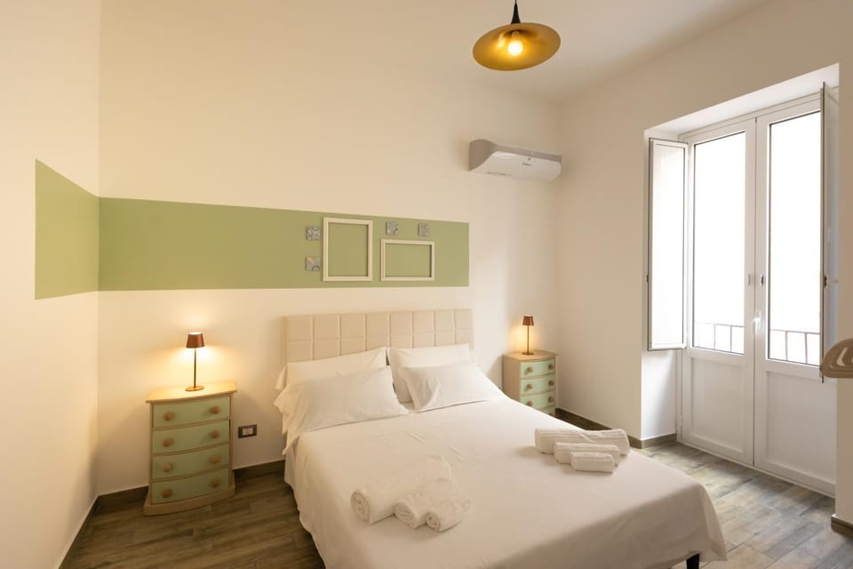 Bed, Photo of the whole room, Bedroom, towels, air conditioner