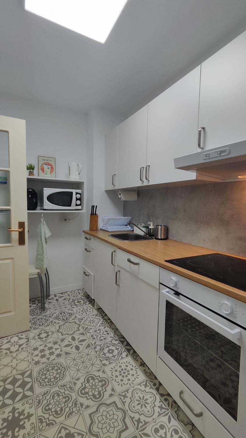 Kitchen or kitchenette, stove