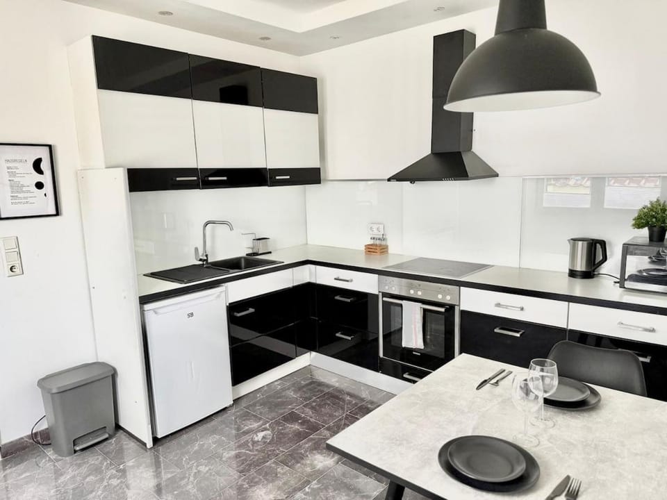 Kitchen or kitchenette, oven, stove
