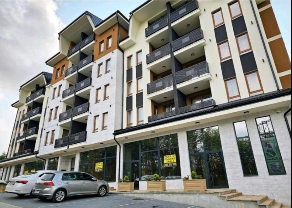 Property building, Day, Parking