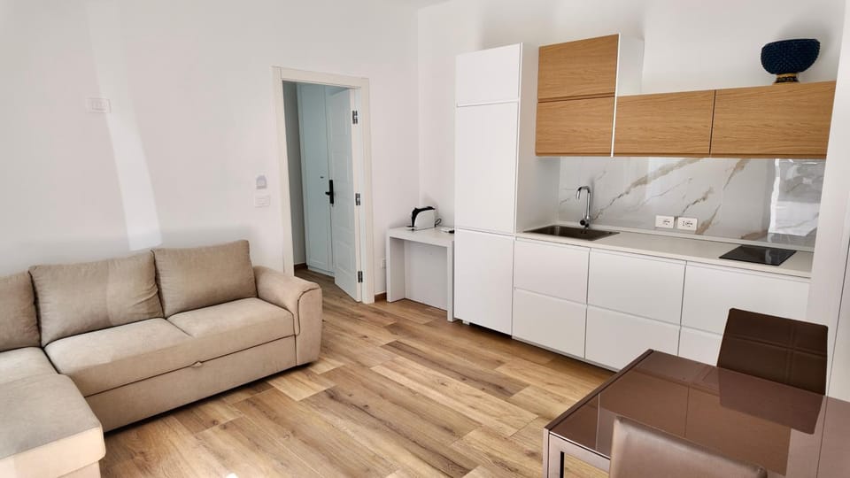 Kitchen or kitchenette, Living room, Seating area, stove