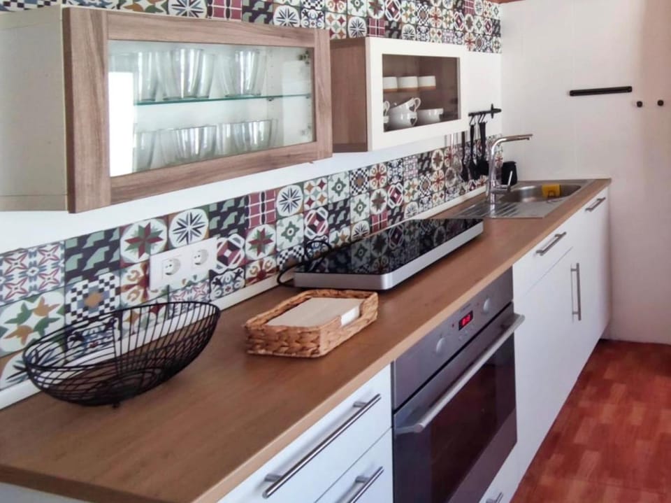 Kitchen or kitchenette, stove