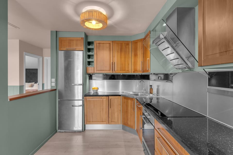 Kitchen or kitchenette, dishwasher, oven, stove