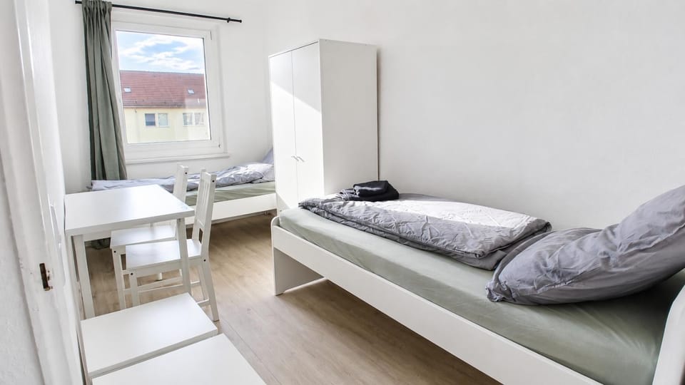 Bed, Seating area, Bedroom, towels, wardrobe
