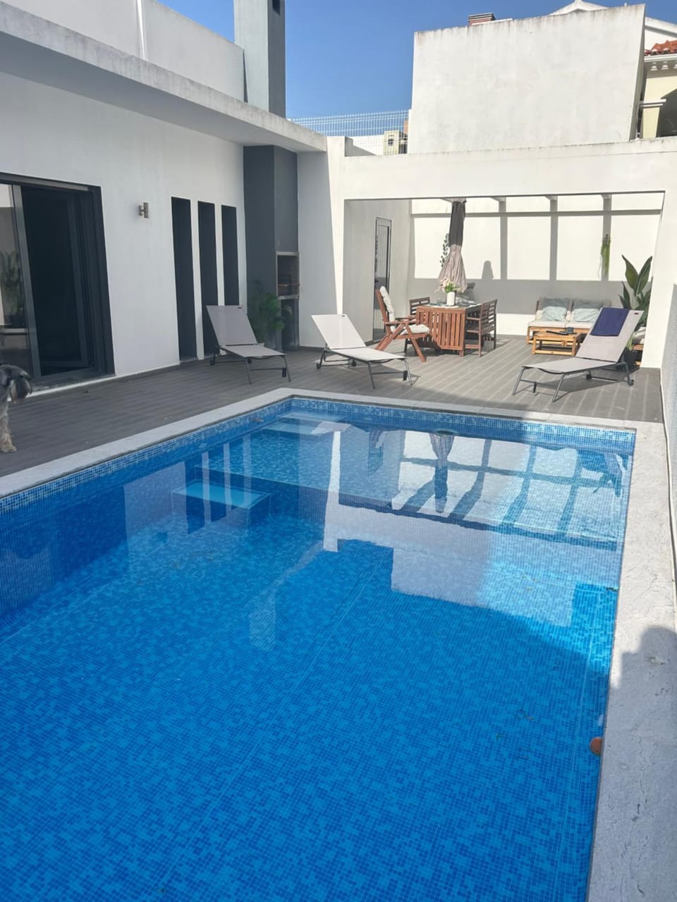 Swimming pool, sunbed
