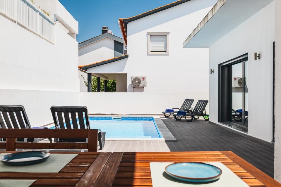 Patio, Seating area, Pool view, Swimming pool, sunbed