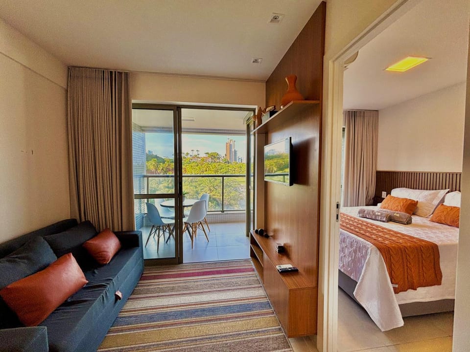 Communal lounge/ TV room, Bed, TV and multimedia, Living room, Decorative detail, Seating area, Bedroom, internet, air conditioner