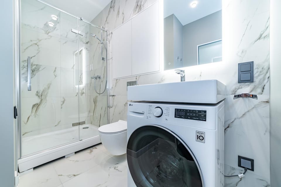 Shower, Bathroom, towels, washing machine, dryer