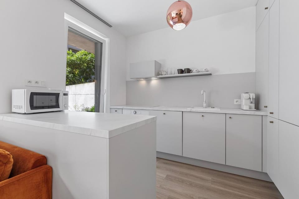 Kitchen or kitchenette, dishwasher, oven, stove, kitchen