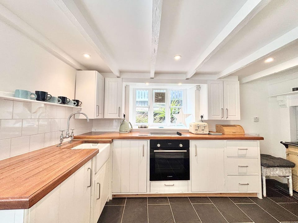 Kitchen or kitchenette, oven, stove, toaster