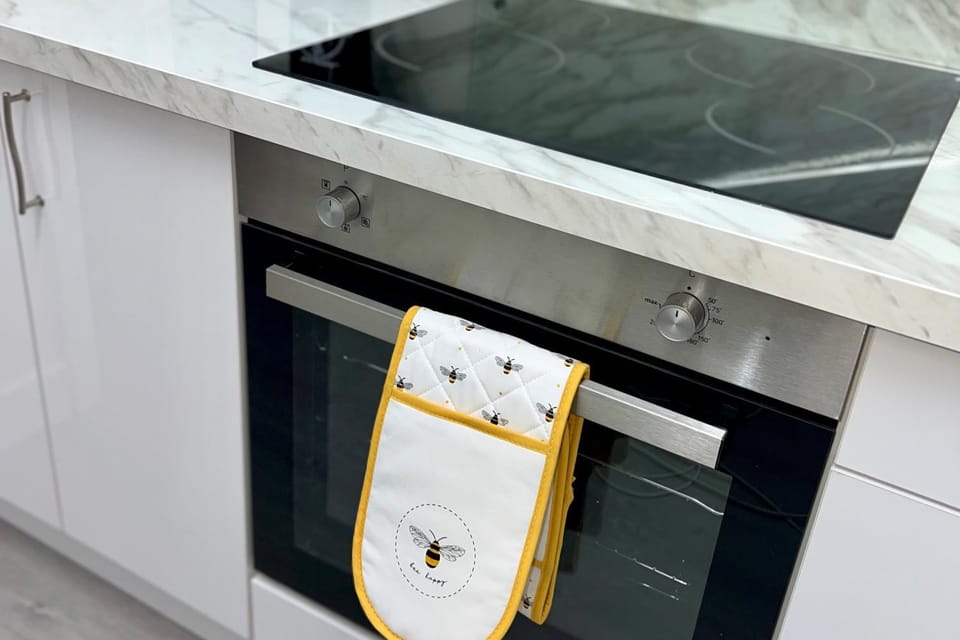 Kitchen or kitchenette, oven, stove