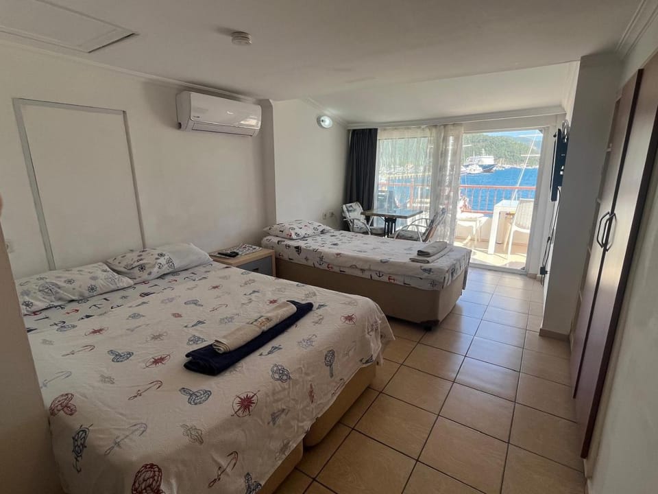Bed, Photo of the whole room, Bedroom, towels, air conditioner