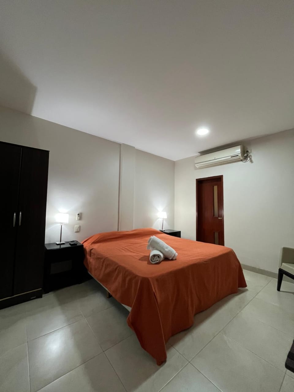 Bed, Bedroom, towels, wardrobe, air conditioner