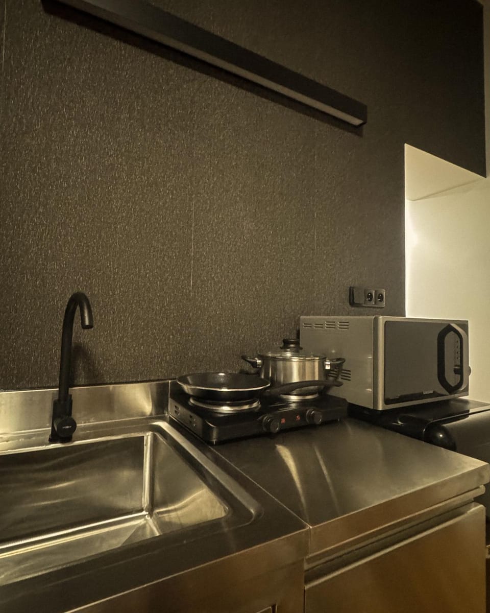 Kitchen or kitchenette, stove