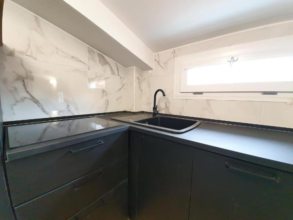 Kitchen or kitchenette, stove