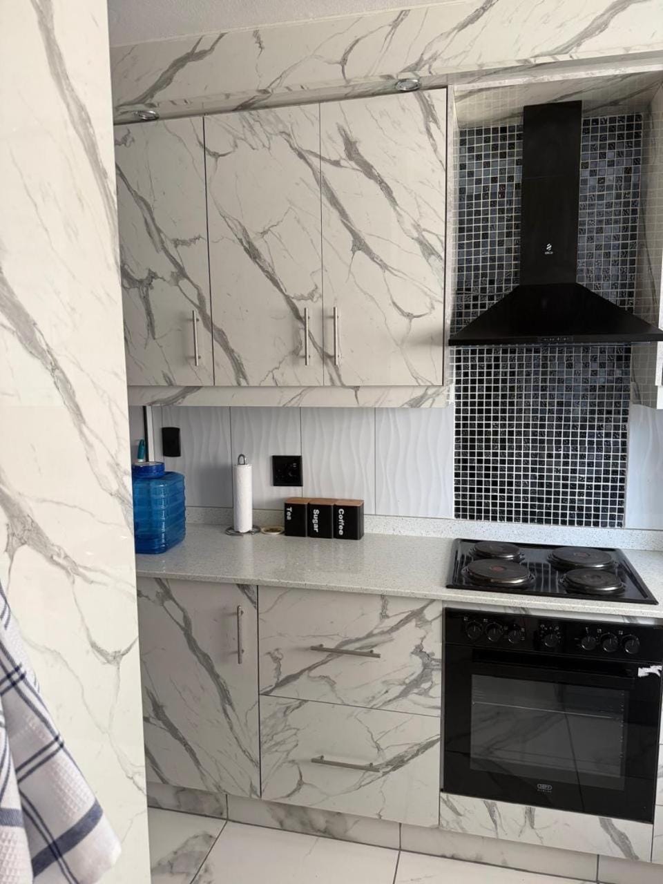 Kitchen or kitchenette, oven, stove