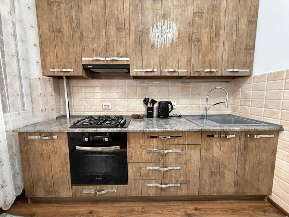 Kitchen or kitchenette, stove