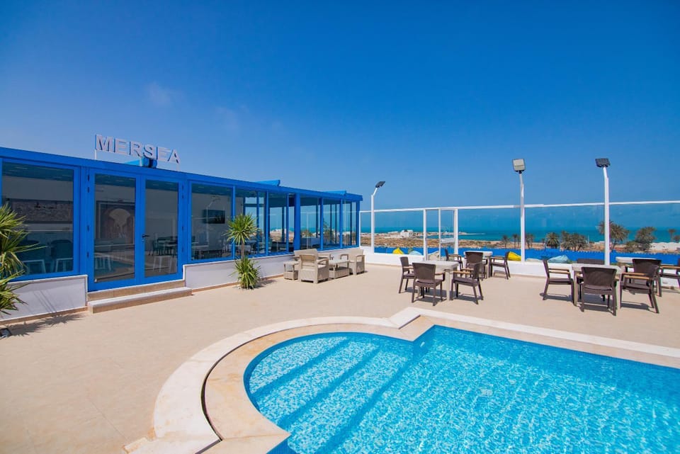 Restaurant/places to eat, Day, Pool view, Sea view, Swimming pool