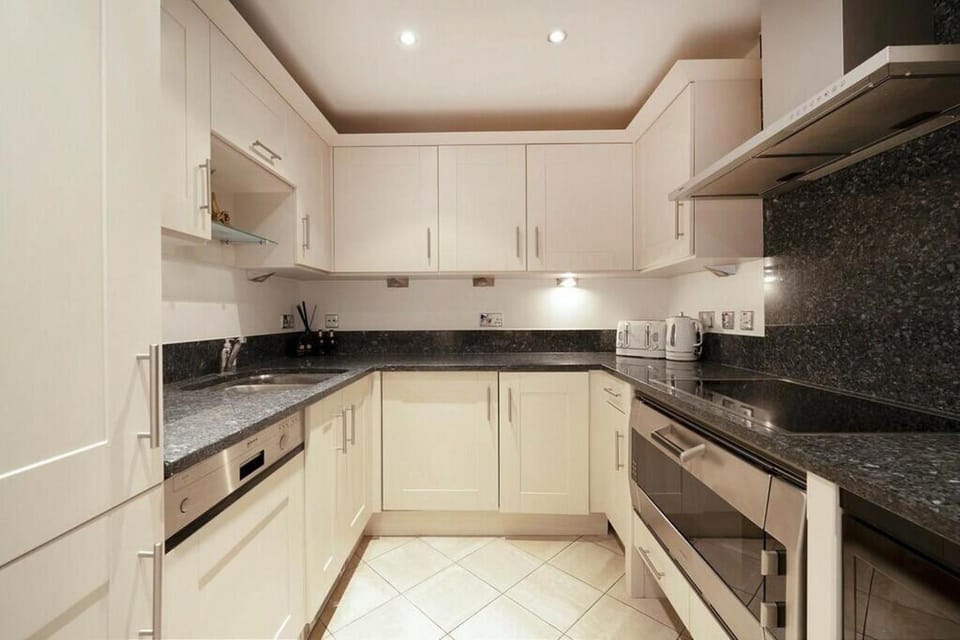 Kitchen or kitchenette, oven, stove