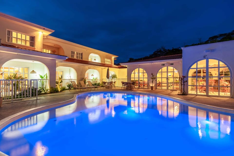 Property building, Night, Pool view, Swimming pool
