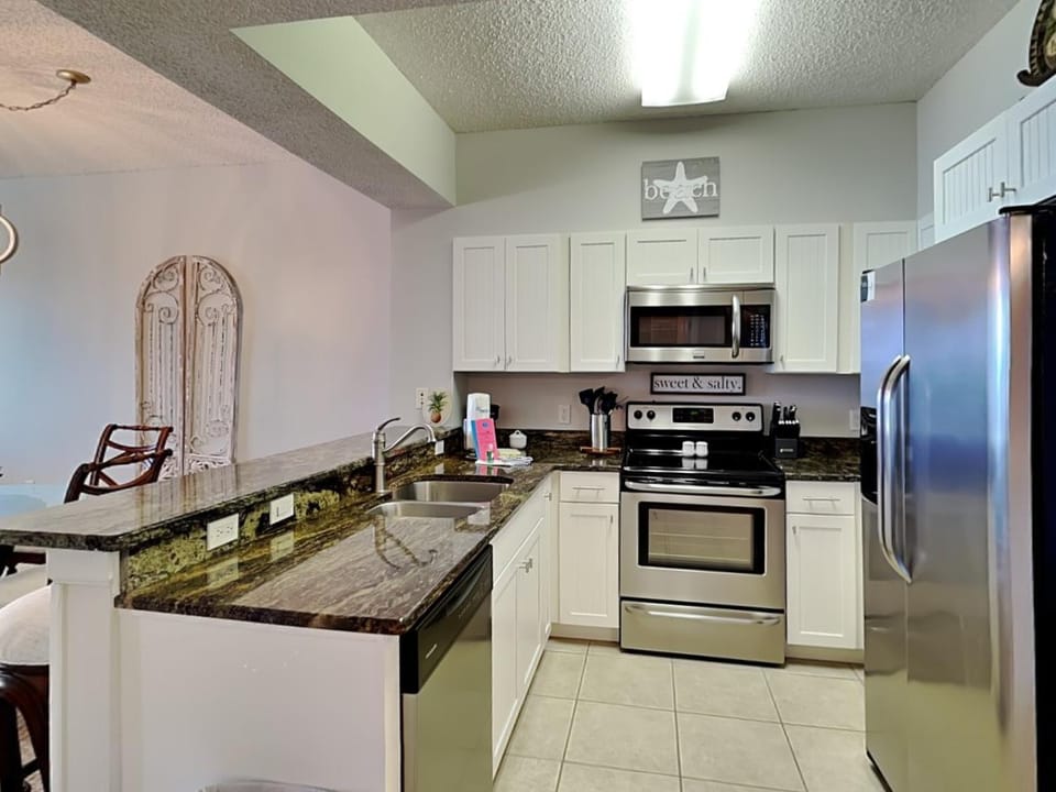 Kitchen or kitchenette, microwave, oven, stove, kitchen