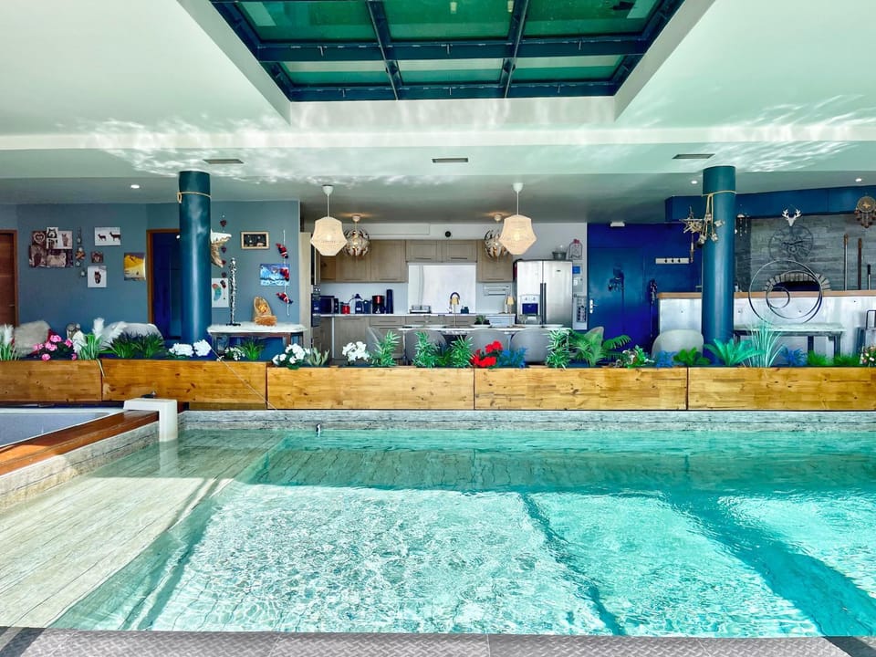 Property building, Living room, Swimming pool